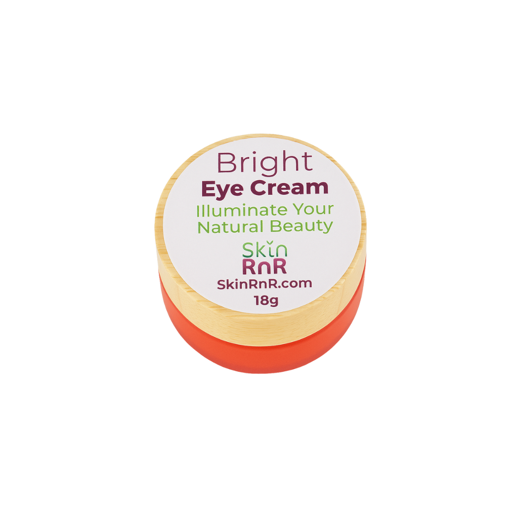 A plant-based brightening eye cream in an orange jar with a natural wooden lid, labeled “Bright Eye Cream – Illuminate Your Natural Beauty” by Skin RnR. Perfect for hydrating and rejuvenating tired eyes.
