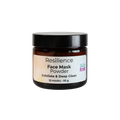An amber jar of Skin RnR Resilience Face Mask Powder with a black lid and white label, a natural exfoliating mask that deeply cleanses pores and revitalizes skin for a smooth, renewed glow.